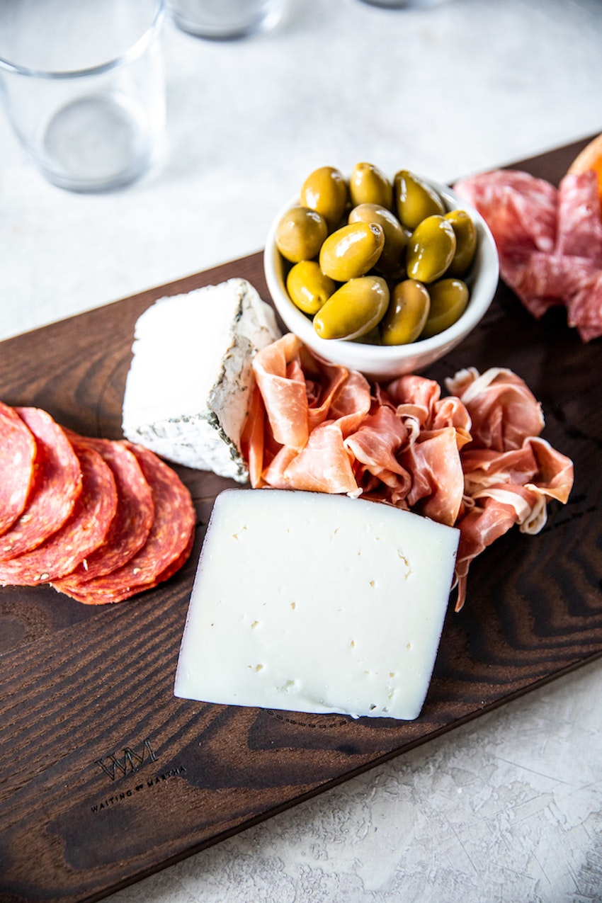 An Epic New Year's Eve Cheeseboard with Homemade Baked Brie | TheInspiredHome.com #newyears #newyearseve #holidays #christmas #cheeseboard #brie #homemade #recipes #appetizers #charcuterie Brieandcheese 38